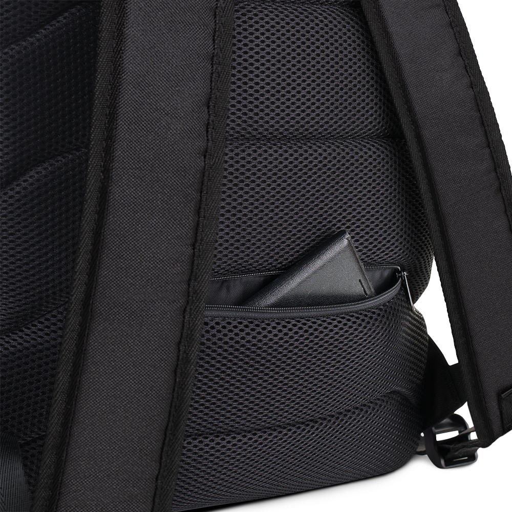 Back Pocket of Black Backpack with Botanical Print of Red Amanita Mushrooms